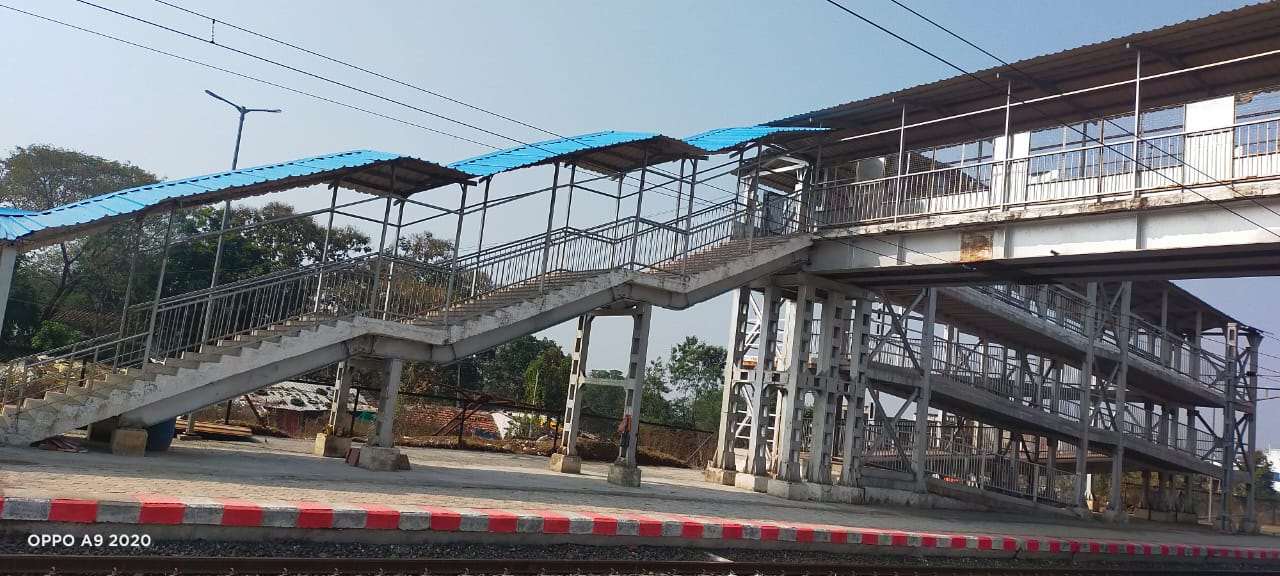 Steel girder being placed at a railway site